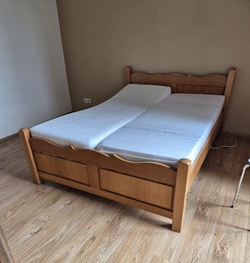 GRATIS Tweepersoonsbed, 2 elektrischverstelbare lattenbodems
