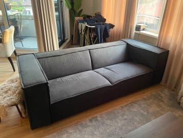 Comfortabele grijze tweepersoonsbank