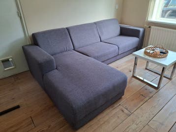 Comfortabele grijze hoekbank met chaise longue