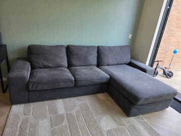 Gratis Grijze hoekbank met chaise longue voor