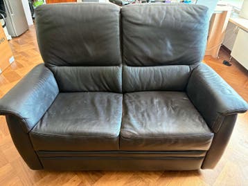Gratis: Comfortabele 2-zits bank van leer