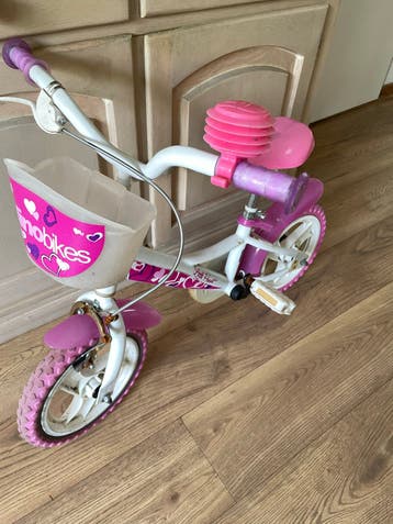 Dino Bikes kinderfiets 10 inch roze met zijwieltjes