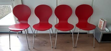 4 houten vlinderstoelen