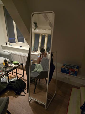 Full-length mirror with hangers