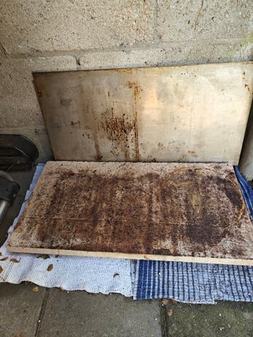 Ovenstenen en bijpassende RVS bakplaten 34 bij 67 cm.