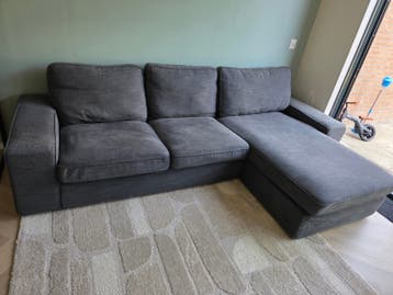 Gratis: Grijze hoekbank met chaise longue