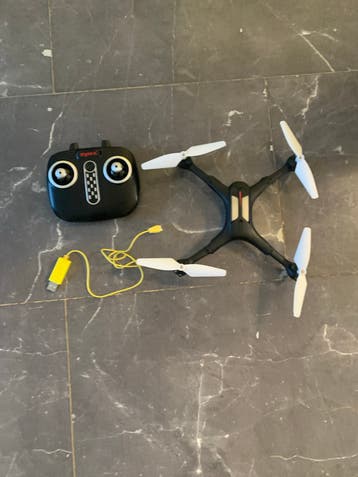 Gratis Syma Drone met Afstandsbediening en Accu (defect)