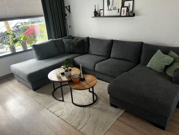 Grote donkergrijze hoekbank met chaise longue