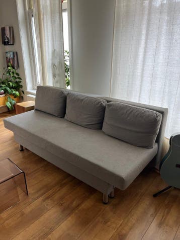 Sofa bed with storage space