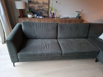 Comfortabele donkergroene hoekbank