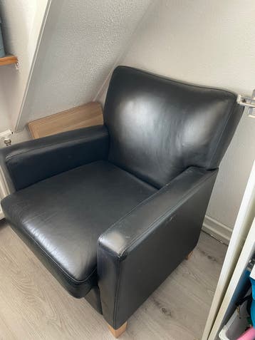 Gratis  zwarte fauteuil
