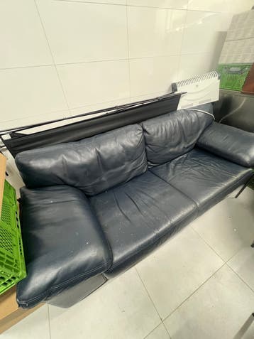 Dark blue leather sofa