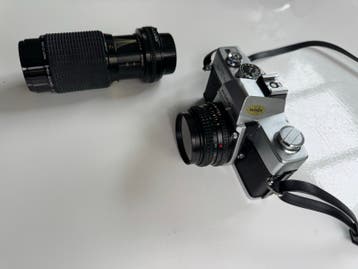 Minolta SR-T 100X Spiegelreflexcamera met 2 lenzen