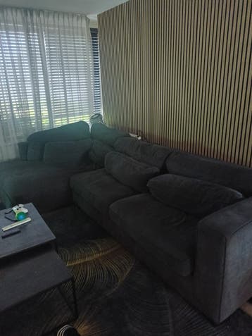 Comfortabele donkergrijze hoekbank