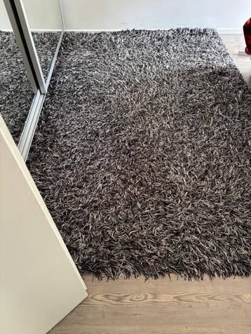 Grijs vloerkleed gratis af te halen