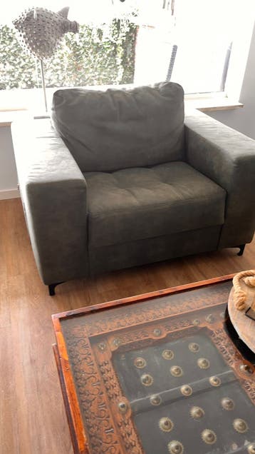 Comfortabele fauteuil in donkergroen