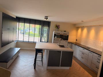Keuken met kookeiland, Miele apparatuur, Corian blad
