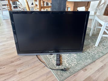 GRATIS alleen vandaag ;Sharp TV  en muurbeugel
