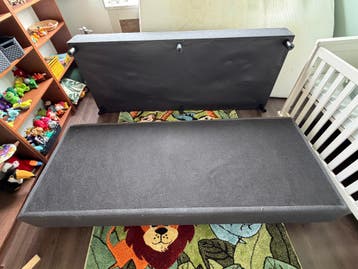 Zwarte bedbox met hoofdbord van Kwantum