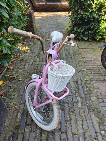 Roze Raaks kinderfiets 18 inch met mandje - Gebruikt