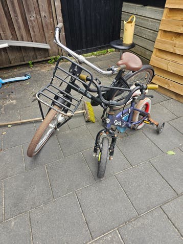 Gratis Kinderfiets met zijwieltjes en damesfiets