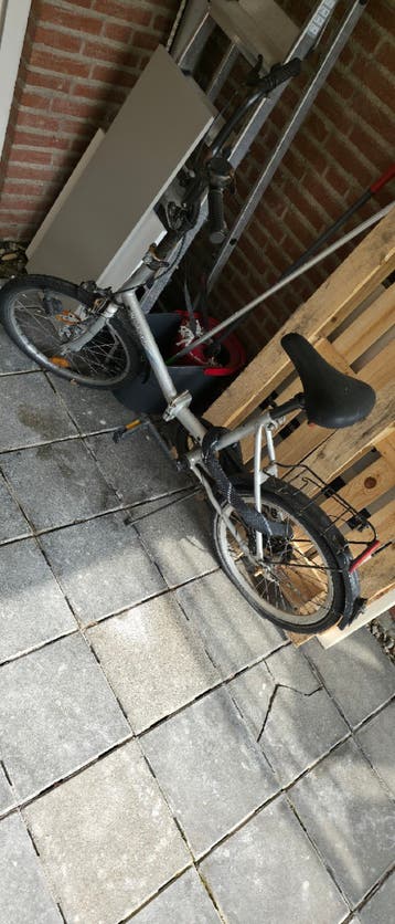 Gratis opvouwbare fiets met lekke band