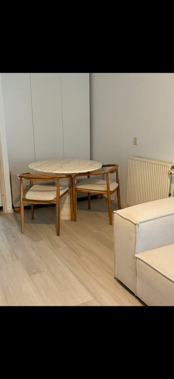 GRATS Ronde travertine eettafel MOET WEG
