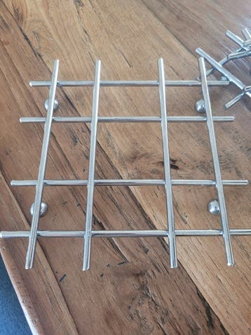 Set van 4 metalen onderzetters, hittebestendig