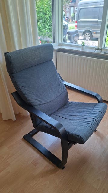 Comfortabele grijze fauteuil