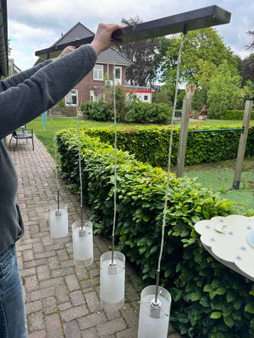 Moderne hanglamp met 4 glazen cilinders