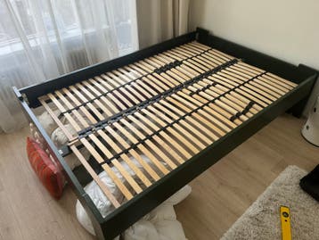Bed met verstelbare bedbodems