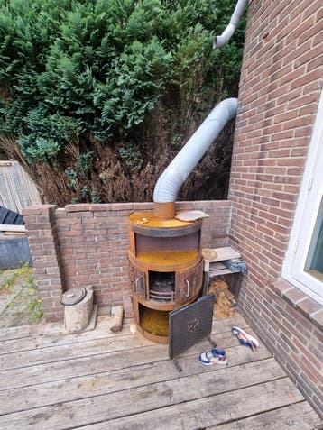 Gratis kachel met 8 meter kachelpijp - zelf demonteren