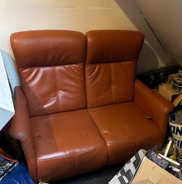 Gratis dubbelzitter fauteuil van leer