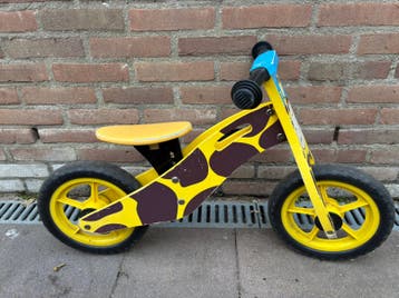 Houten loopfiets met giraffe design