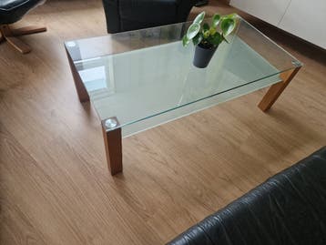 glazen salontafel met lichteiken poten