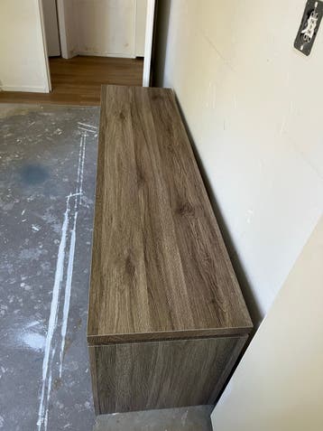Gebruikte TV-kast 150 cm breed met fragiele lades
