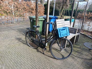 Gratis klassieke fiets met krat