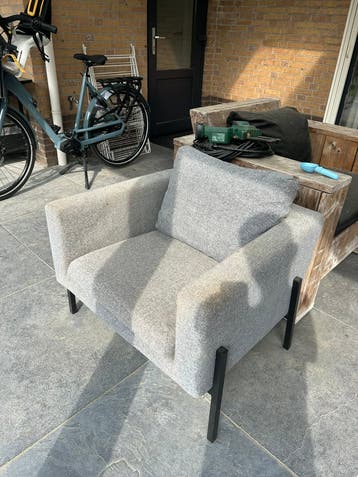 Grijze fauteuil