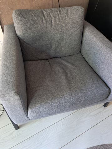 Comfortabele grijze fauteuil