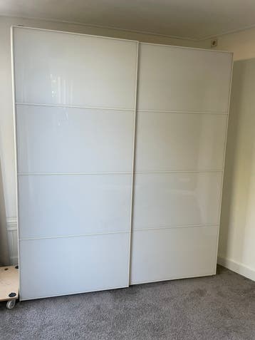 Ikea Farvik schuifdeuren wit glas