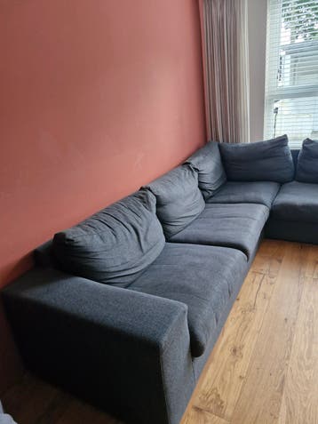 Gratis afhalen! Grijze stoffen hoekbank