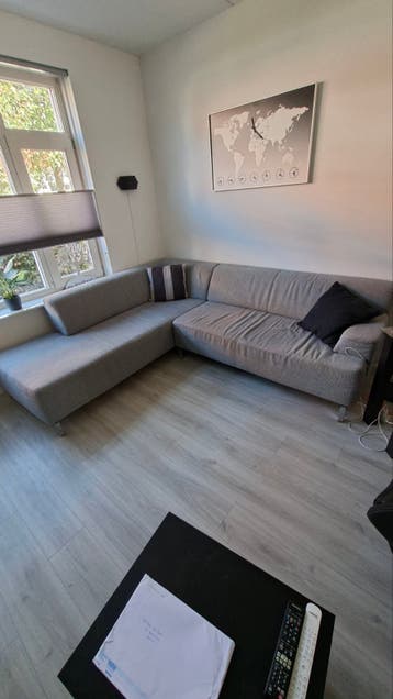 Grijze stoffen hoekbank - Comfortabel en modern