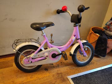 Gratis puky kinderfiets lila, met bagagedrager