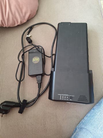 Gratis E-bike Smart Batterij 36V 9000mAh met lader defect?