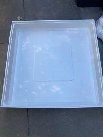 Lekbak wasmachine