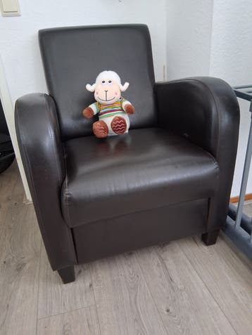 Fauteuil donkerbruin gratis