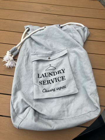 Grattis waszak met 'Laundry Service' opdruk