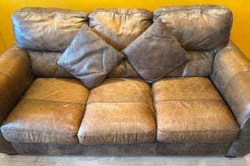 Used couch 3 + 2 seater with bed option & hocker