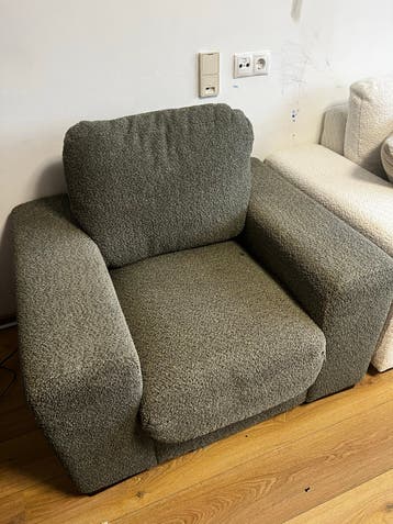 Comfortabele groene fauteuil