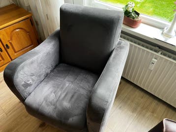Grijze fauteuil